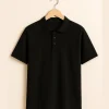 black-polo-t-shirt-women-hanger